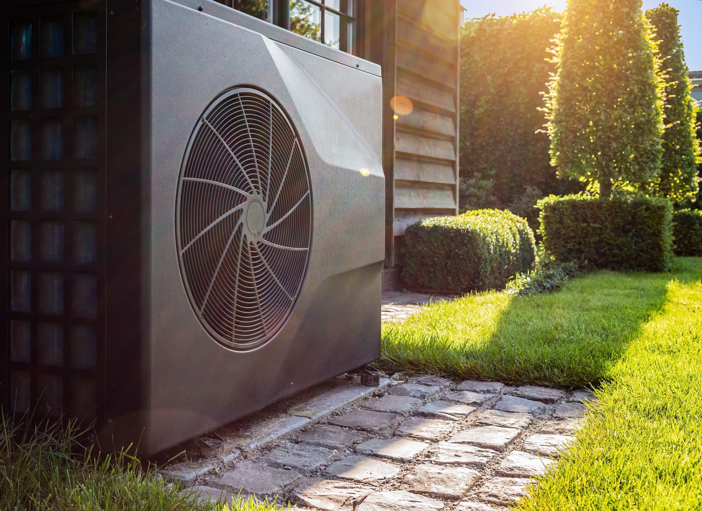 Pool Heater on a nice warm sunny day by the back of a house