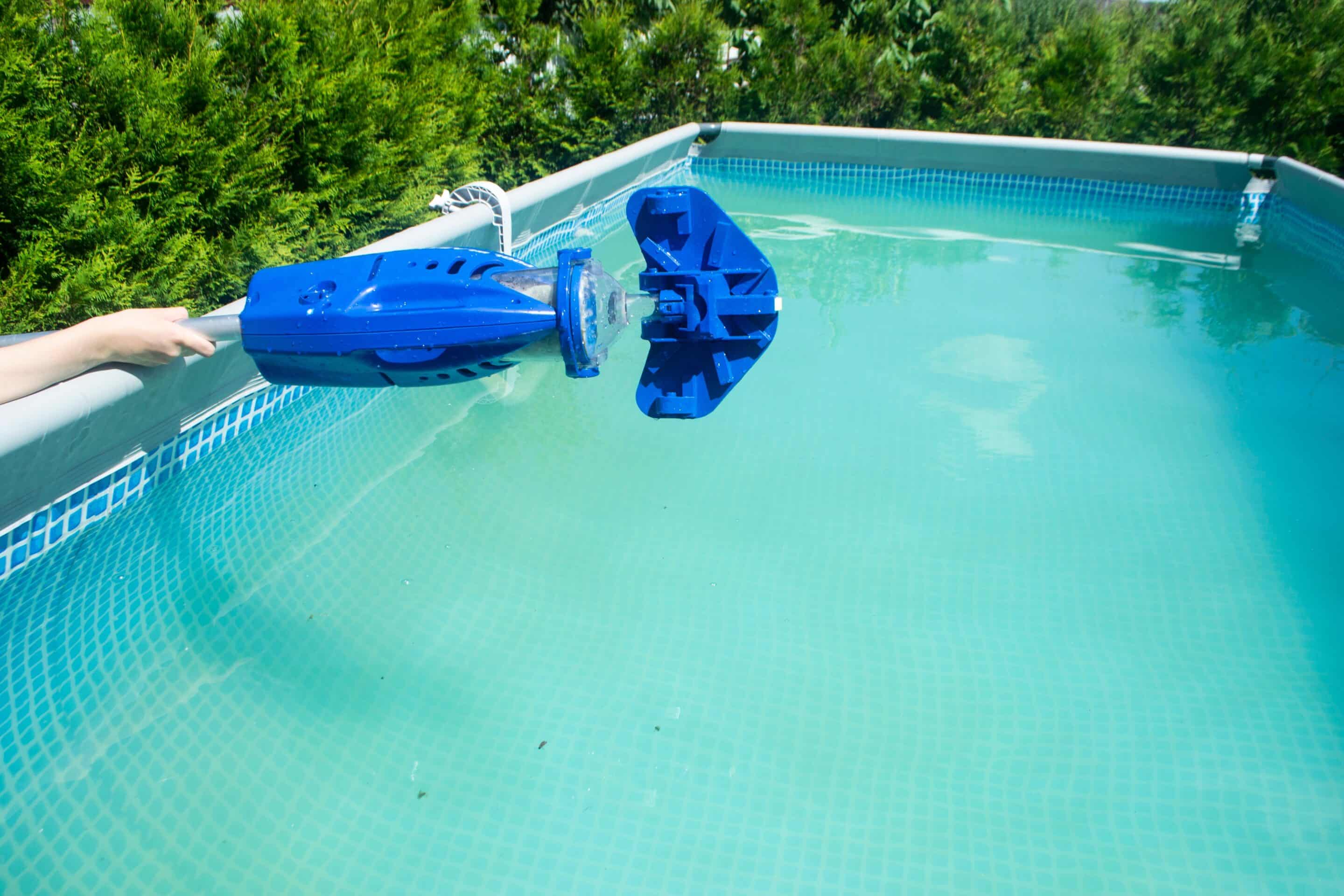 Handheld,Pool,Vacuum,Cleaner.,Dirty,Water,In,The,Summer,Pool.